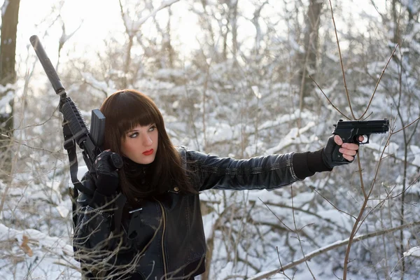 Portrait of armed sexy young lady — Stock Photo, Image