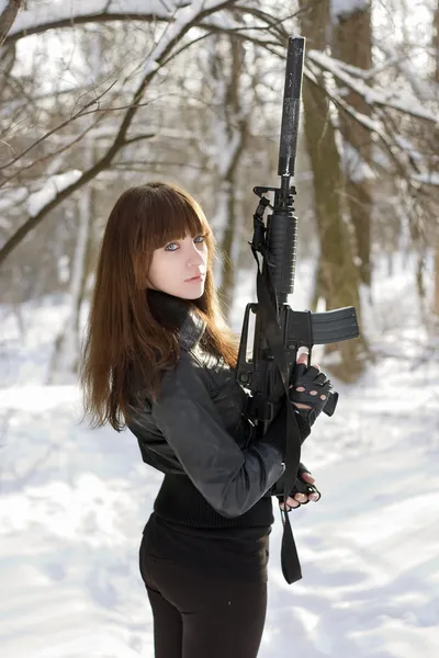 Turned lady with the gun — Stock Photo, Image
