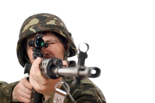 Soldier aiming a rifle — Stock Photo, Image