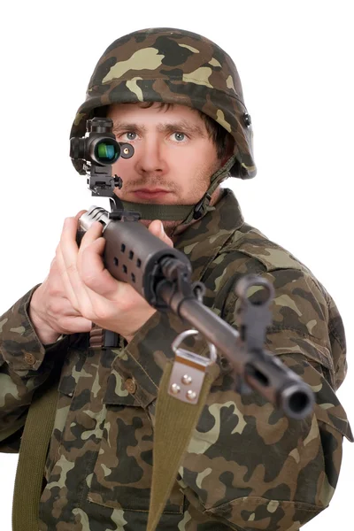 Soldier keeping a rifle — Stock Photo, Image