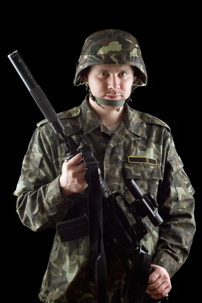 Armed soldier grasping m16 — Stock Photo, Image