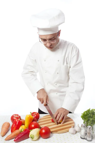 Man in white cooking — Stock Photo, Image