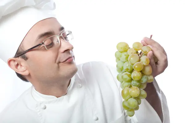 Jefe cocinero y uva blanca — Foto de Stock