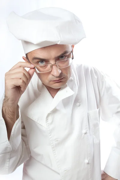 Chief cook looking over glasses — Stock Photo, Image