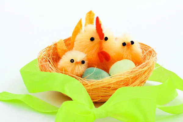 Easter chickens and hen in a nest — Stock Photo, Image