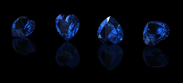 黑色背景上心的蓝色蓝宝石形状. — 图库照片