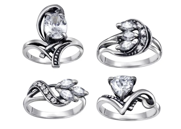 Anéis com gemas isoladas em fundo branco — Fotografia de Stock