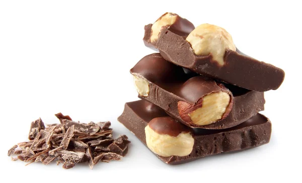 Pedaços de chocolate com nozes — Fotografia de Stock
