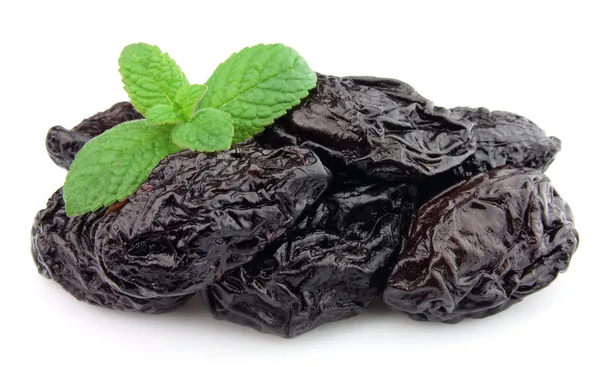 Prunes with mint — Stock Photo, Image