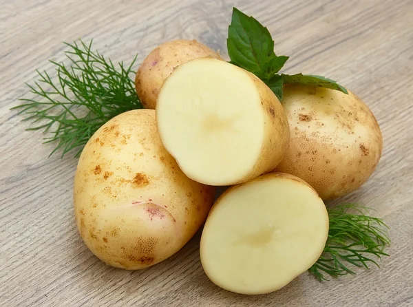 Young potato with greens — Stock Photo, Image
