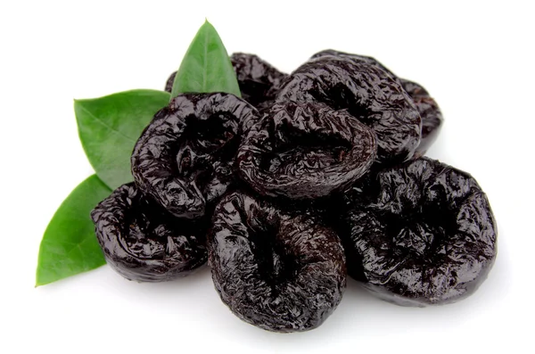 Prunes with leafs — Stock Photo, Image