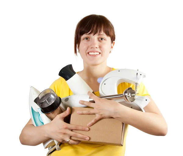 Meisje met huishoudelijke apparaten — Stockfoto