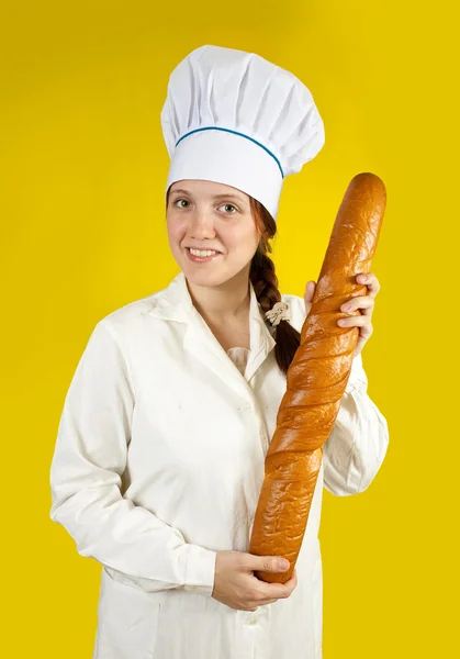 Panadero con pan francés — Foto de Stock