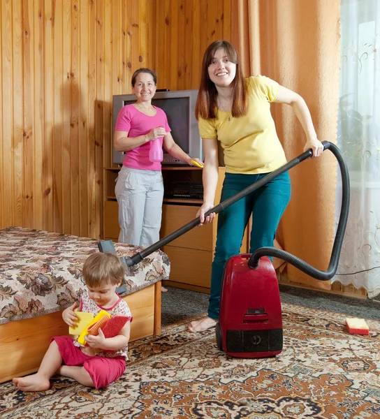 Family is cleans living room — Stock Photo, Image