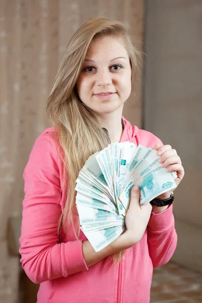 Happy girl with many roubles — Stock Photo, Image
