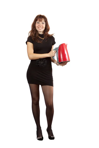 Девушка с электрическим чайником — стоковое фото