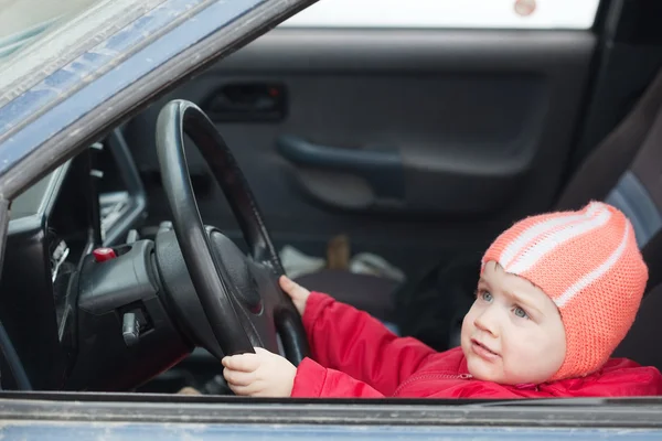 Baby girl driving car — Stock Photo, Image