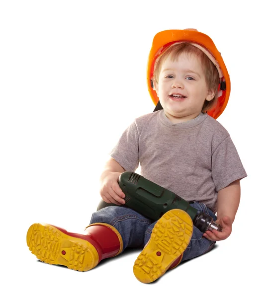 Criança de chapéu duro com broca. Isolado sobre branco — Fotografia de Stock