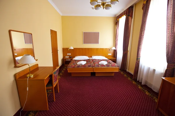 高級ホテルのスイート ルームの寝室 ロイヤリティフリーのストック画像