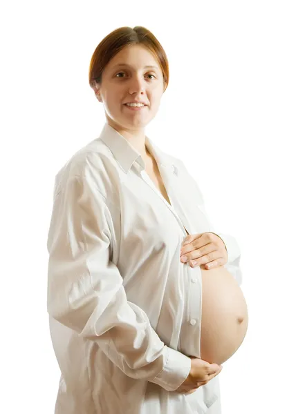 Szczęśliwy w ciąży kobieta w białej koszuli — Zdjęcie stockowe