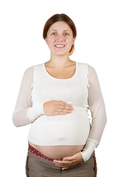 Щаслива вагітна жінка тримає її животик — стокове фото