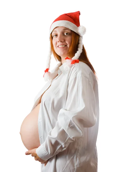 Terhes nő karácsonyi kalapban — Stock Fotó