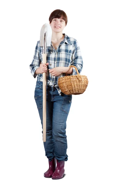 Woman with spade and basket — Stock Photo, Image