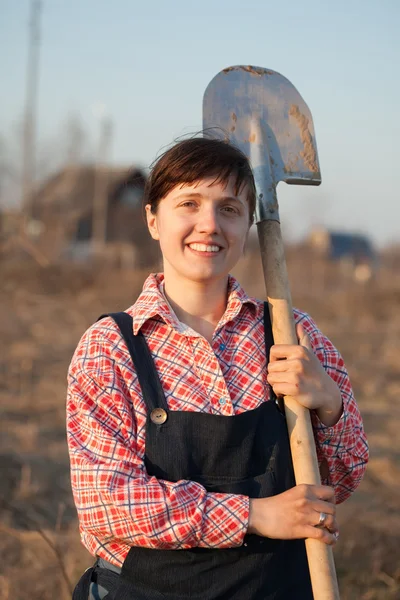 Gelukkig boer met spade — Stockfoto