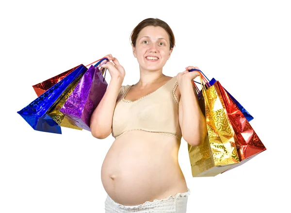 Terhes nő a bevásárló szatyrok — Stock Fotó
