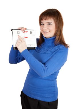 Girl pointing to date in loose-leaf calendar clipart