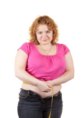 Fat unsightly woman measuring waist clipart
