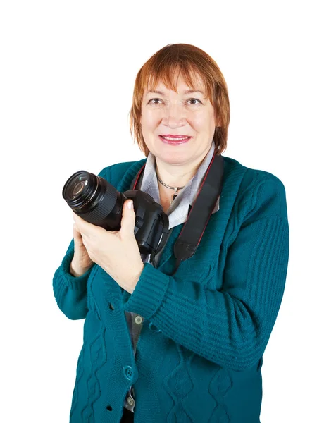 Старша жінка-фотограф з фотоапаратом — стокове фото