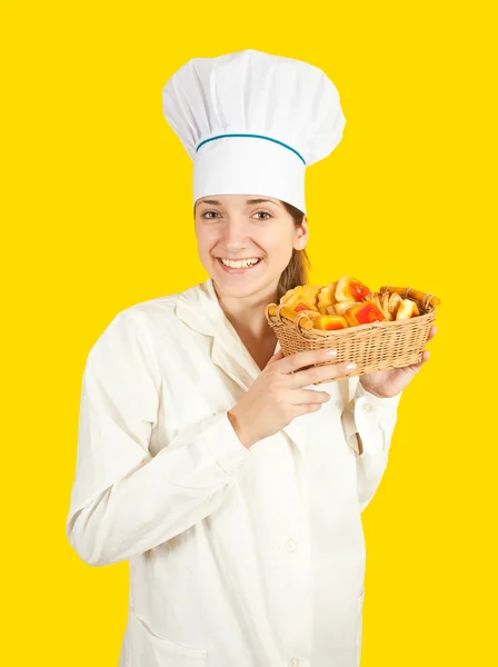 Vrouwelijke kok met snoep — Stockfoto