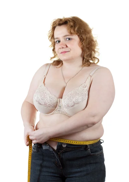 Mulher que mede a cintura com fita métrica — Fotografia de Stock