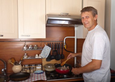 Man roasting meat clipart