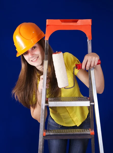 Painter girl with paint rollers — Stock Photo, Image