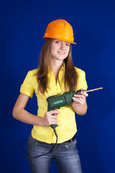 Stavební dělník s vrtákem — Stock fotografie