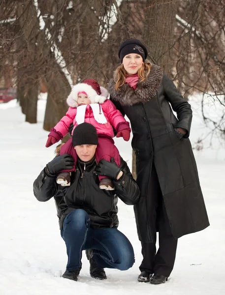 Parents with toddler in winter — Stock Photo, Image