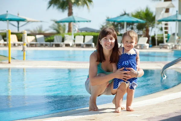 stock image Happy mother with toddler at resort