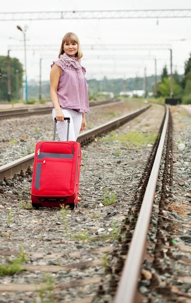 Femme avec des bagages — Photo