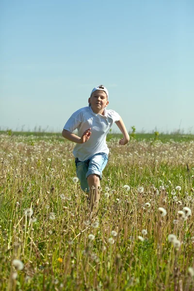 Running teen boy — Stock Photo, Image