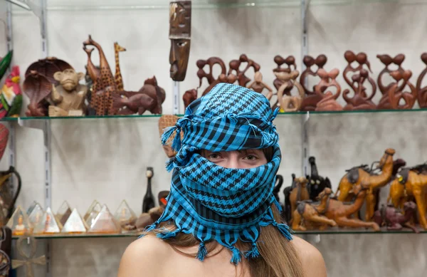 Woman in egyptian souvenirs shop