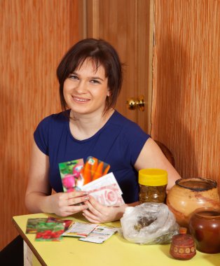 Woman with various seeds clipart