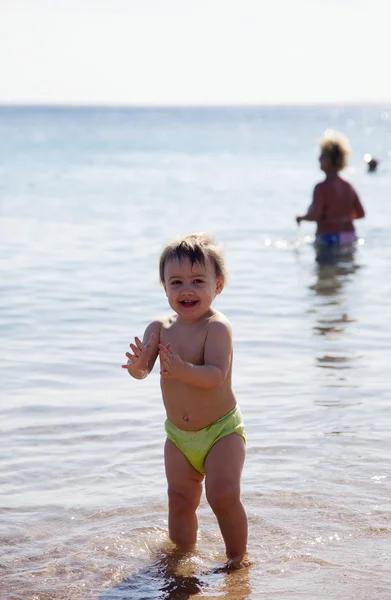 Happy toddler in sea — Stock Photo, Image
