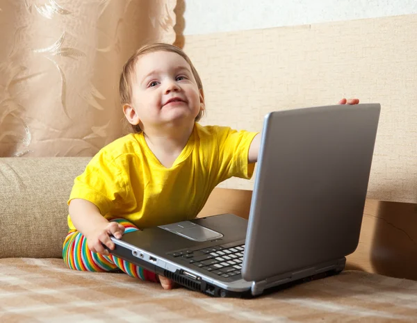 Baby girl with laptop — Stock Photo, Image