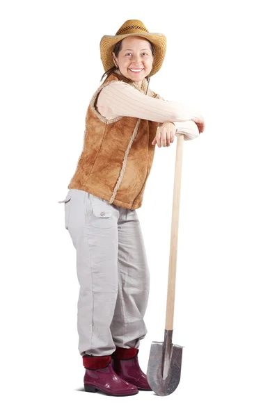 Glad mogen kvinna med spade — Stockfoto