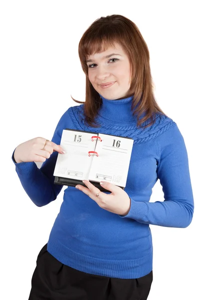 Girl pointing to date in diary — Stock Photo, Image