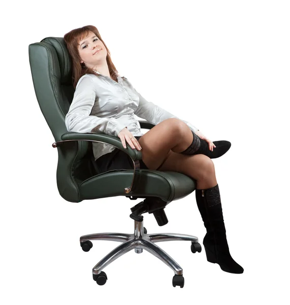 Obchodní žena sedící na luxusní kancelářské křeslo — Stock fotografie
