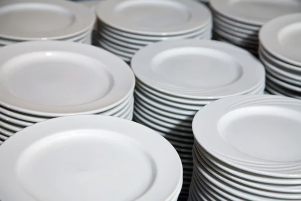 Many plates stacked together — Stock Photo, Image