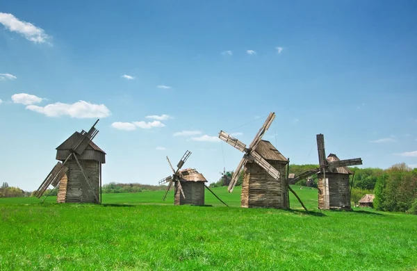 stock image Ancient windmills in field